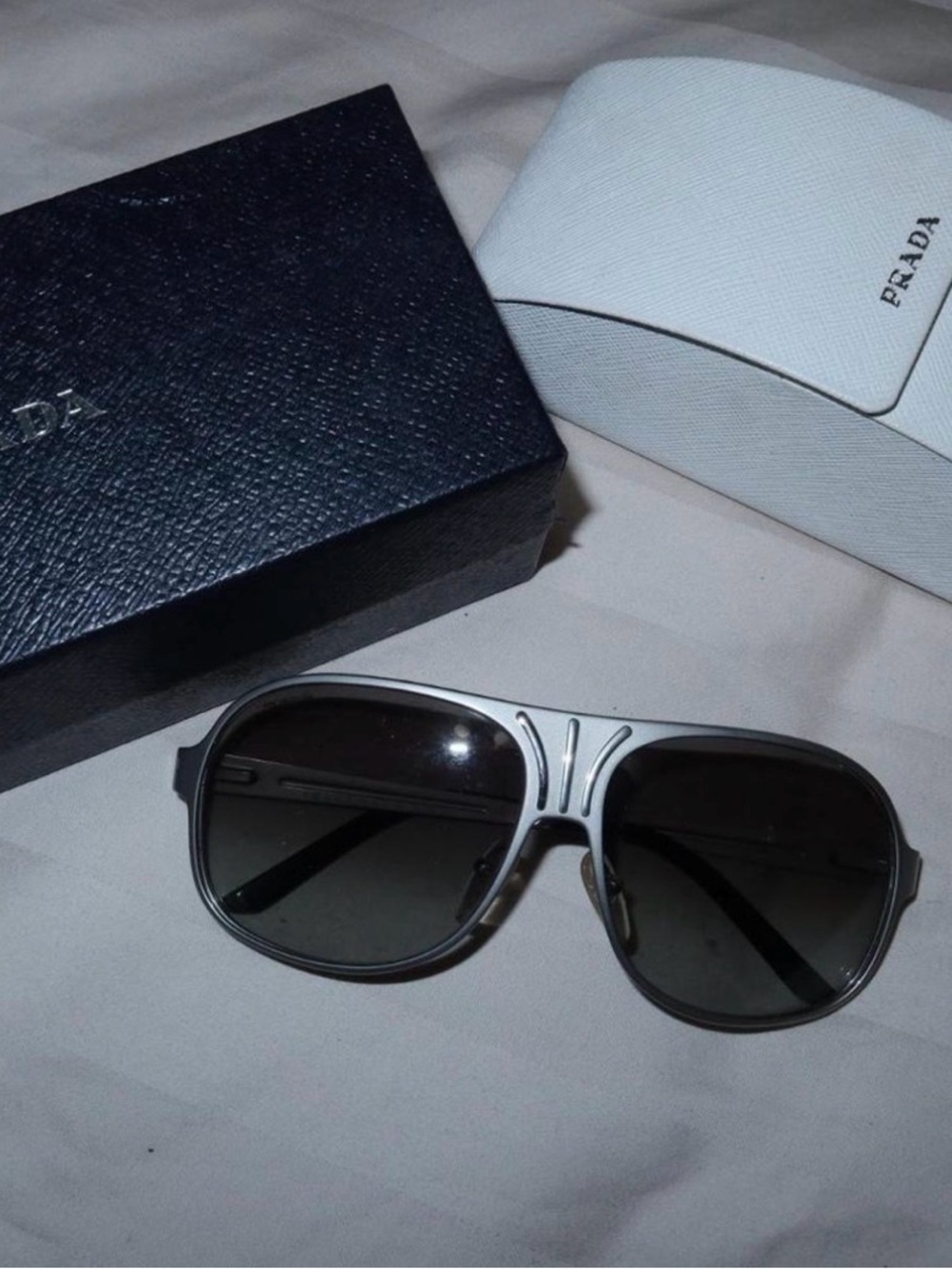Prada Silver Aviator Sunglasses with Dark Lenses